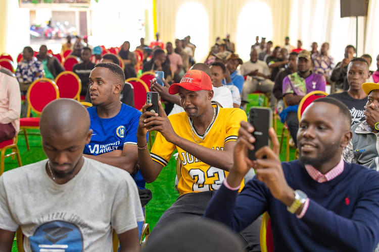 Football funs follow proceedings during the launch of Sh3.5 million football tournament at Kinoru Stadium, March 7, 2024.