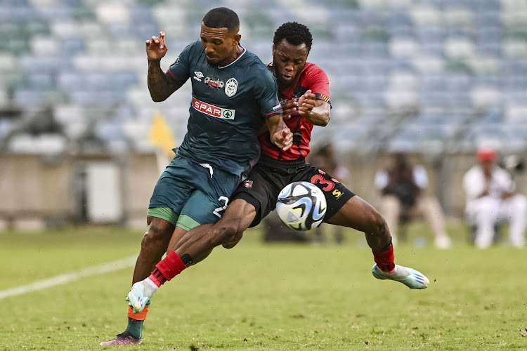 Wayde Jooste of AmaZulu FC and Kganyane Letsoenyo of TS Galaxy FC during the Carling Knockout, semi-final match on Sunday