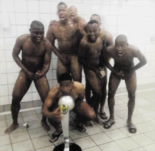 FOUNTAIN OF YOUTH: A picture of Thandani Ntshumayelo, in front, and fellow Orlando Pirates players posing naked with the Nedbank Cup trophy in the changing room showers caused a stir on social media