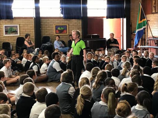 MOTIVATING TALK: Fitness guru Daniel Schoeman of Motion Fitness gym shares his personal journey with Laërskool Grens pupils Picture: GUGU PHANDLE