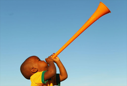 A child blowing a vuvuzela. File photo