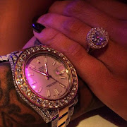 Erica Mena's engagement ring and Bow Wow's wrist.