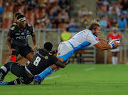 Pierre Schoeman of the Vodacom Bulls tackled by Tera Mthembu of the Cell C Sharks during the Super Rugby friendly match between Vodacom Bulls and Cell C Sharks at Peter Mokaba Stadium on January 27, 2018 in Polokwane, South Africa. 