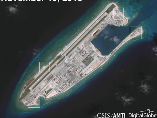 A satellite image shows what CSIS Asia Maritime Transparency Initiative says appears to be anti-aircraft guns and what are likely to be close-in weapons systems (CIWS) on the artificial island Fiery Cross Reef in the South China Sea in this image released on December 13, 2016. /REUTERS
