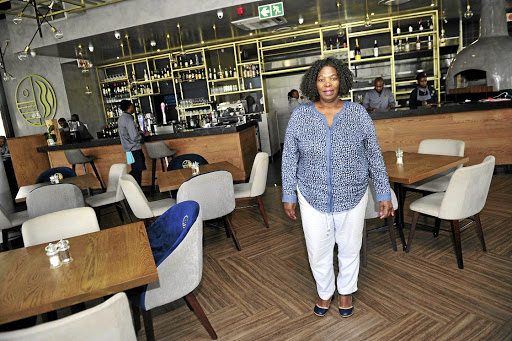 Cwane inside her fancy restuarant in Modderfontein which employs 25 staffers.