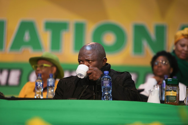ANC deputy president David Mabuza sips a hot drink during the nomination process on December 17 2022 at Nasrec during the 55th ANC national conference.