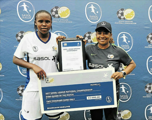 TOP OF HER GAME: Zimasa Dekeda of Thunderbirds was awarded the Diski Queen of the Match by Desiree Ellis at the Sasol League national championships held at Kabokweni Stadium on TuesdayPicture: BACKPAGEPIX