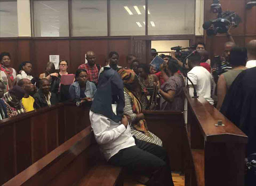 Mother and her boyfriend appear in Durban Magistrate's Court for the outcome of the DNA test. Picture: Jackie Clausen