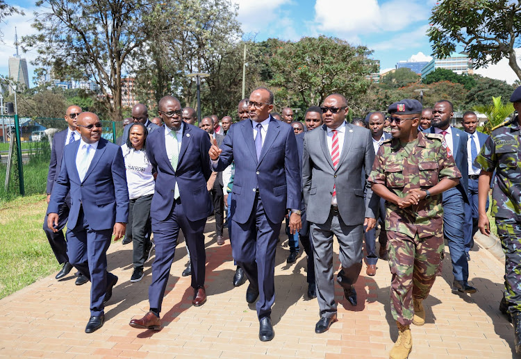 Defence CS Aden Duale with Nairobi Governor Johnson Sakaja, other officials and security officers during the handover of Uhuru Park to Nairobi County Government on April 18, 2024.