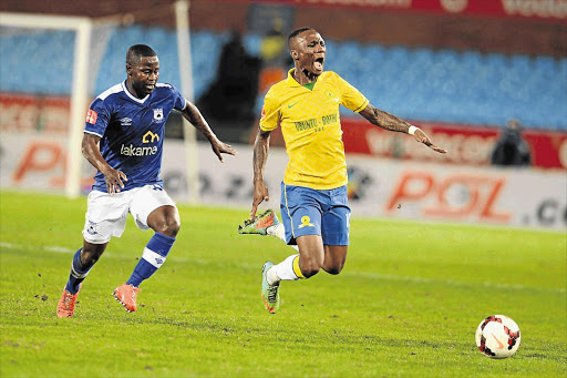 ACCUSED: Teko Modise, right, is one of four Bafana players charged by Safa for not reporting for national duty in May