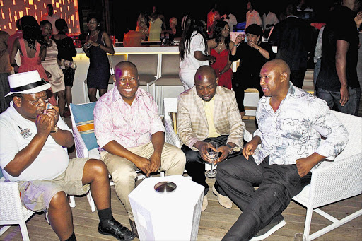 ANC Youth League president Julius Malema socialises with friends Picture: SIMPHIWE MHLAMBI