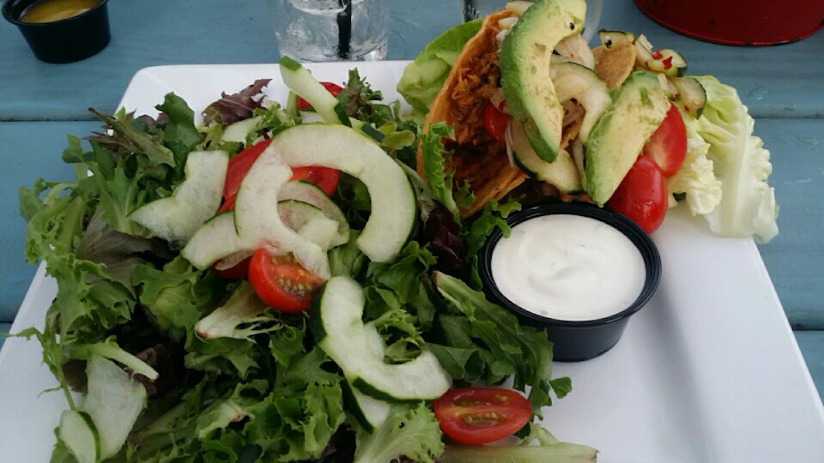 BBQ pork tacos with avocado, and chipotle sour cream.  Side salad.