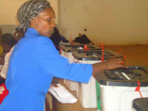 A woman votes during Jubilee Party nominations on April 26, 2017. /REUBEN GITHINJI