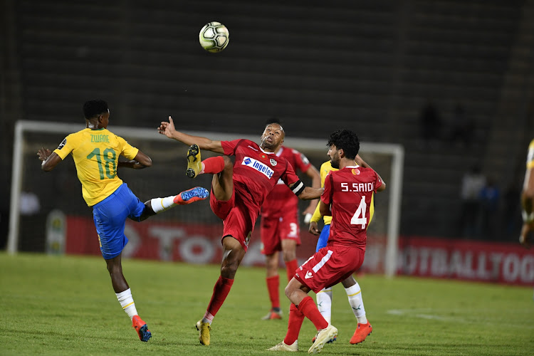 Themba Zwane of Mamelodi Sundowns and Brahim Nakach of Wydad Athletic Club during the CAF Champions League match between League: Mamelodi Sundowns and Wydad Athletic Club at Lucas Moripe Stadium on January 19, 2019 in Pretoria, South Africa.