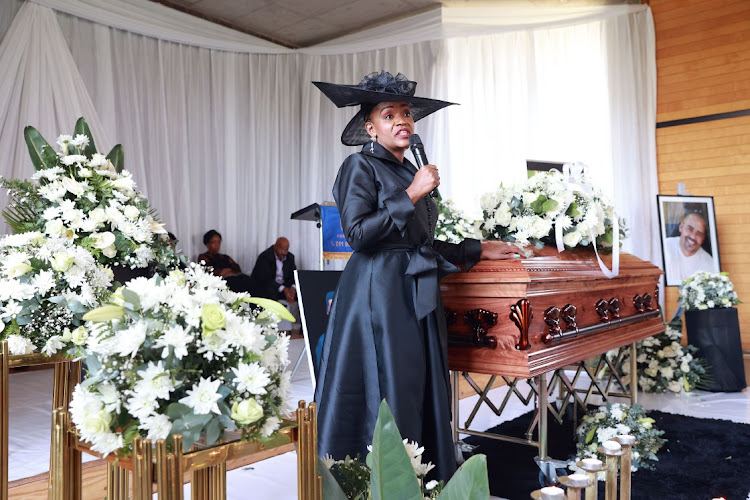 Dr Michael Isabelle’s widow Lindelwa speaks at his funeral service at Nasrec Memorial Park in Johannesburg on Tuesday.