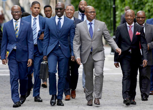 From left to right are National Treasury director general Dondo Mogajane, Finance Minister Malusi Gigaba, Deputy Minister of Finance Sfiso Buthelezi and SARS Commissioner Tom Moyane on their way to the medium-term budget speech of the Finance Minister Malusi Gigaba at parliament in Cape Town . PICTURE: ESA ALEXANDER