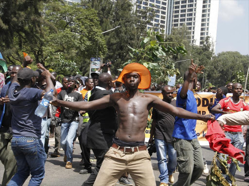A Cord supporter dance during the Madaraka day rally organised by the opposition at Uhuru park yesterday. Photo/Monicah Mwangi