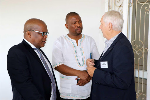 BUSINESS AND POLITICS: From left, Buffalo City Metro mayor Xola Pakati, ANC provincial chairman Oscar Mabuyane and Bill Cozens of Regent Hotels share a few words after the business breakfast addressed by Mabuyane at the East London Golf Club yesterday Picture: ZOLILE MENZELWA