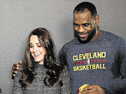 SHOULDER 'CHARGE': Catherine, Duchess of Cambridge, with basketball star LeBron James, who has caused something of a storm in the royal tea cup