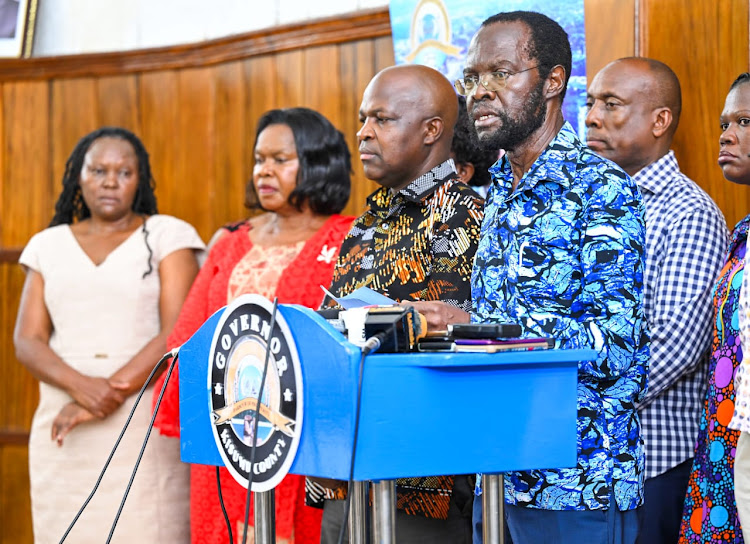 Kisumu Governor Anyang' Nyong’o, his deputy Mathews Owili and county executive members during the flood update in the county.