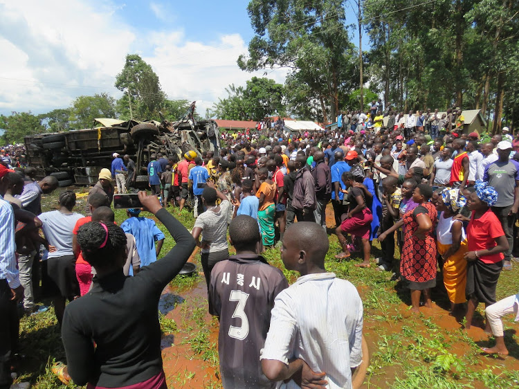 Residents of Mundika at the accident scene.