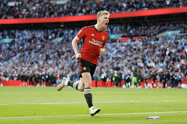 Rasmus Hojlund celebrates after Manchester United's winning penalty in the shoot-out of the FA Cup semifinal against Coventry City at Wembley Stadium on Sunday.