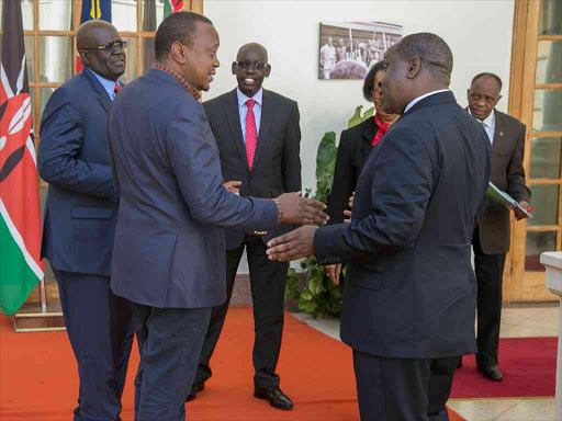 President Uhuru Kenyatta was this morning at State House, Nairobi briefed on the 2016 Kenya Certificate of Primary Education (K.C.P.E) examination by Education Cabinet Secretary, Fred Matiang'i ahead of the release of the results on December 1,2016.The Cabinet Secretary was accompanied by PS Education Belio Kipsang,CEO, Teachers Service Commission, Nancy Macharia, Kenya National Examination Council (KNEC) Chairman, Prof. George Magoha, and CEO, KNEC , Mercy Karogo.