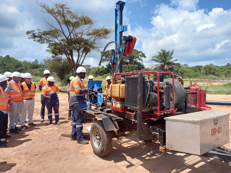 A worker demonstrates the drilling process at Base Titanium in Kwale County on Monday, October 23, 2023.