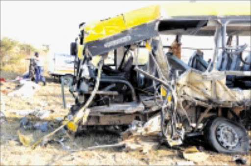 WRECK: This Bahwaduba Bus Services bus was involved in an accident with a Malawian truck on the N1 outside Polokwane yesterday. Nine people are reported to have died at the scene while the injured were taken to hospitals in Polokwane. Pic: ELIJAR MUSHIANA. 18/06/2009. © Sowetan. HORRIFIC:The remains of an accident involving the Mahwaduba Bus Services which collided head on with a Malawian truck on the N1 road outside Polokwane on Thursday (yesterday). Nine people were reported died at the scene while injured were rushed to Polokwane Hospital. PHOTO: ELIJAR MUSHIANA