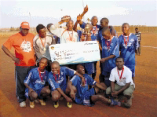 TOP DOGS: City Stars' players and officials celebrate after winning the Coca-Cola Shanduka tournament in Vosloorus at the weekend.PHOTO: Meshack Khotha. 08/09/08. © Sowetan.