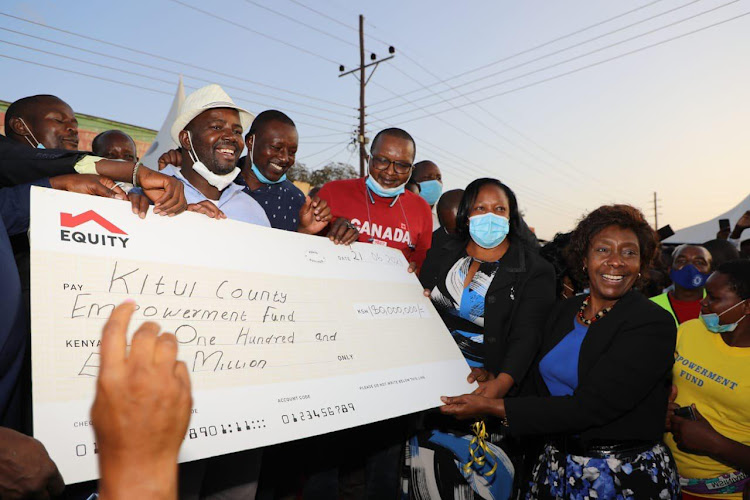 Kitui Governor Charity Ngilu with MCAs during the launch of the Sh180 million County Empowerment Fund in Kyuso on Tuesday, June 22, 2021