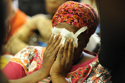 Bertha Molefe, who lost her daughter breaks down during the media briefing by the Health Ombudsman to announce the final report on the Life Esidimeni psychiatric patients’ deaths on February 01, 2017 in Pretoria. File photo