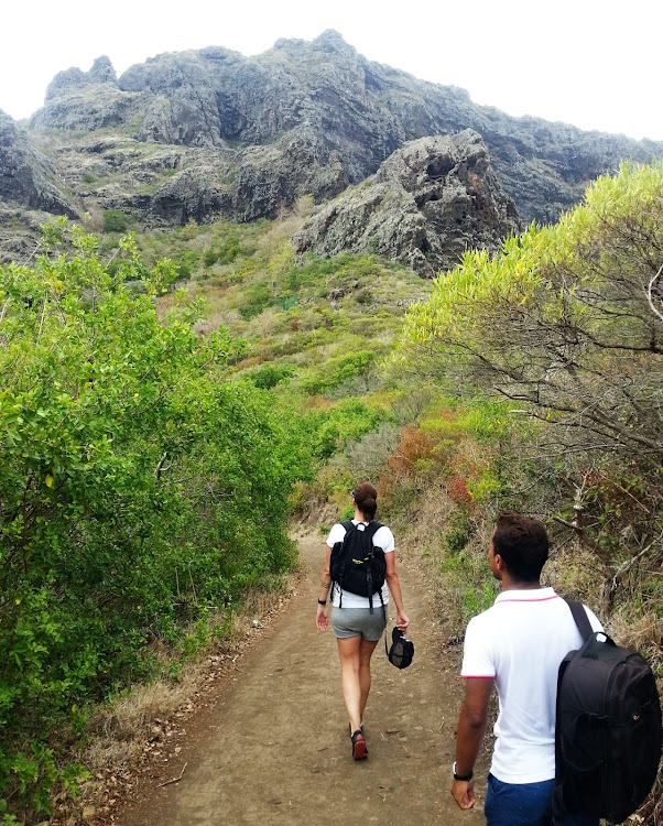 Kimberley Reid and Anoop Jahul hike up Le Morne