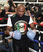 WBC/WBA welterweight champion Floyd Mayweather Jr. works out at the Mayweather Boxing Club on April 14, 2015 in Las Vegas, Nevada. Mayweather will face WBO welterweight champion Manny Pacquiao in a unification bout on May 2, 2015 in Las Vegas.