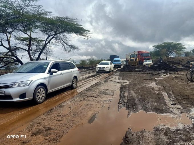 The Nairobi - Mai Mahiu - Narok Highway undergoing clearance of the overburden after heavy rainfall which resulted in flooding and extensive deposition of eroded material on the road.