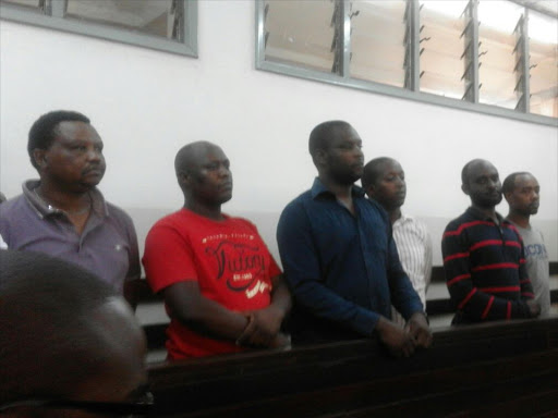 The six taxi drivers who were charged with attempted murder and malicious damage of a vehicle, in connection to the torching of Uber taxis, at Kibera law courts, March 29, 2016. Photo/ANNETTE WAMBULWA