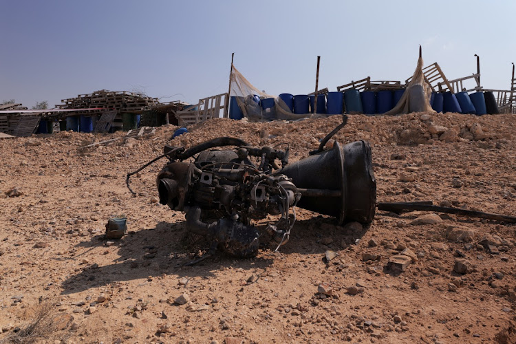 The remains of a rocket booster that according to Israeli authorities critically injured a seven-year-old girl in Arad, Israel, after Iran launched drones and missiles towards Israel on Sunday. Picture: REUTERS/CHRISTOPHE VAN DER PERRE/TPX IMAGES OF THE DAY