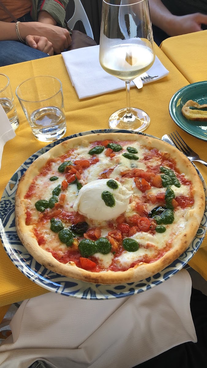 Gluten free Pizza portofino with a whole buratta! Made in a separate kitchen to ensure its celiac safe!
