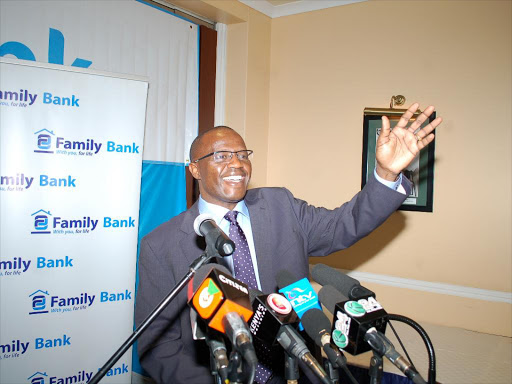 FAMILY BANK CEO PETER MUNYIRI KBA chief executive Habil Olaka with his KCB counterpart Joshua Oigara witness the launch of e-learning Finance Industry platform by CBK governor Patrick Njoroge with the help of KBA director of communication Nuru Mugambi last year/FILE