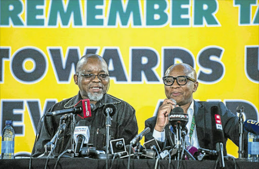 BOWING OUT: The ANC's outgoing secretary-general Gwede Mantashe and spokesman Zizi Kodwa address journalists during the ANC’s 54th national conference yesterday Picture: AFP