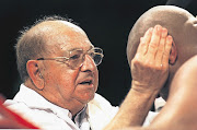 Angelo Dundee works on George Foreman during his 1995 fight against Axel Schulz Picture: Mike Powell/ALLSPORT