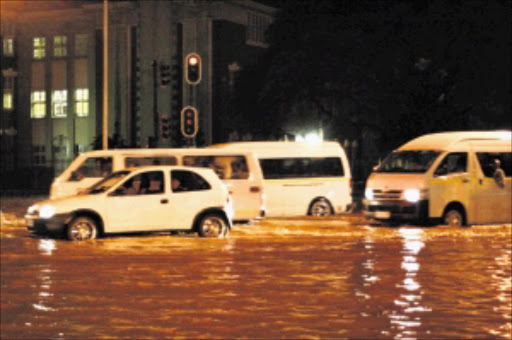 STRANDED: Williams Road in Durban was flooded yesterday following heavy rainstorms that hit the province, causing major delays in traffic. Pic: THULI DLAMINI. 17/02/2010. © Sowetan.