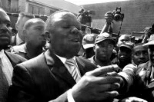 TOLERANCE PLEA: MDC leader Morgan Tsvangirai talking to displaced foreigners at Alexandra police station yesterday. Pic. Lucky Nxumalo. 22/05/2008. © Sowetan