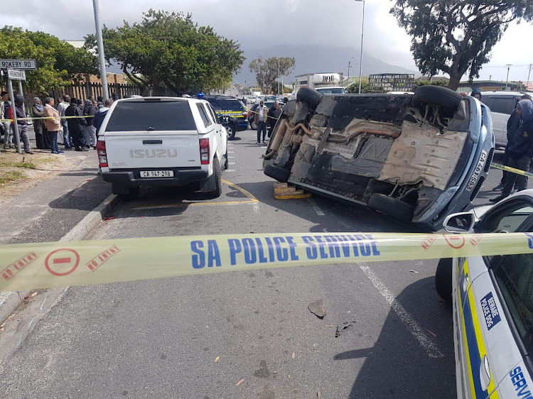An innocent bystander was allegedly shot by police in Cape Town when they attempted to stop an alleged hijacker.