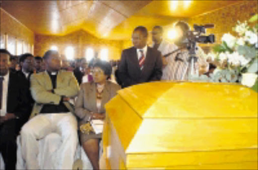 LEADING LIGHT: KwaZulu-Natal Premier Sbusiso Ndebele pays his last respects at the funeral service of businessman Oscar Dhlomo in Umbumbulu, south of Durban. (Pic. Siyabonga Mosunkutu. 06/09/08. © Sowetan.