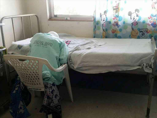 A patient is seen sleeping at KNH ward as doctors strike continues in its 3rd month. Photo/Monicah Mwangi