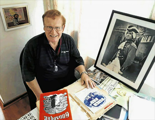 CURTAIN CALL: George Mountjoy, 78, who has been an Arts Theatre board member for decades, examines scrapbooks bearing programmes and reviews of productions he has directed and appeared in over the years. The Arts Theatre building is on the market for R2.5-million but will live on in a new venue Picture:BARBARA HOLLANDS