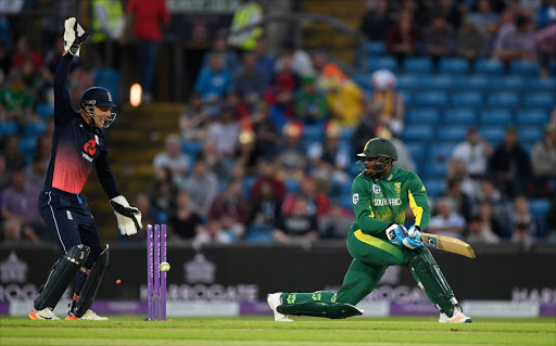 South Africa batsman Andile Phehlukwayo is bowled by Adil Rashid as Jos Buttler celebrates during the 1st Royal London One Day International match between England and South Aafrica at Headingley on May 24, 2017 in Leeds, England. (Photo by Stu Forster/Getty Images)
