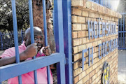 fenced in: 
      Sello Marite could lose a  contract to erect a fence around a school because a supplier has not  delivered the material  
      
      
      
      Photo: Bafana Mahlangu