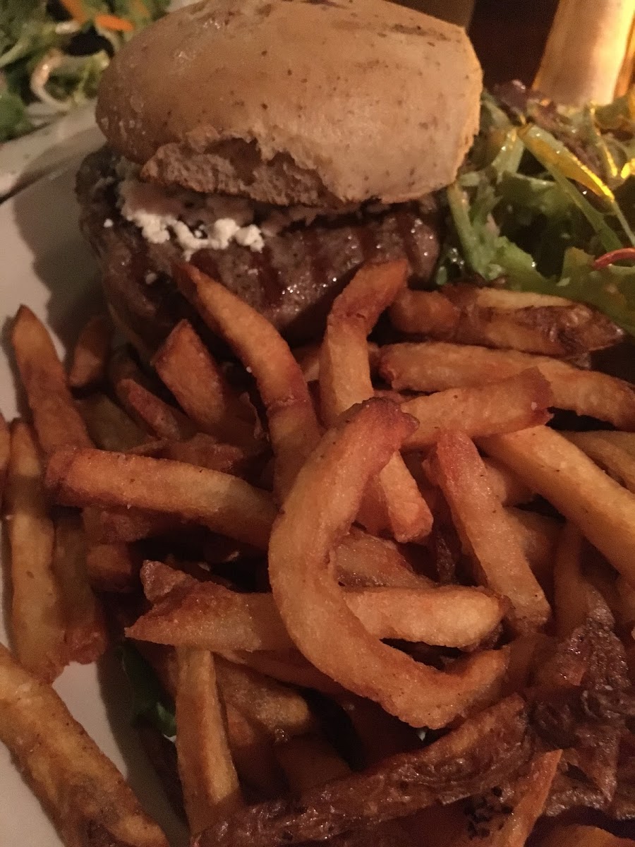 Lamb burger with goat cheese and fries.